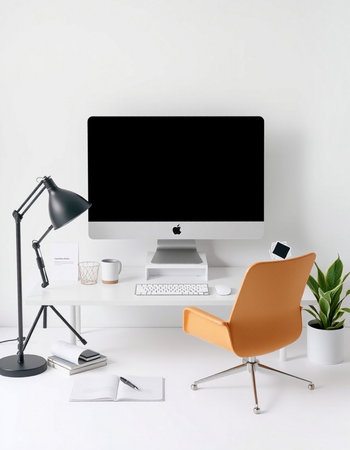 Modern workspace with blank computer monitor, orange armchair, coffee cup, stationery and other...