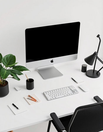 Workplace with computer, stationery and plant on white table. 3d renderingの写真素材