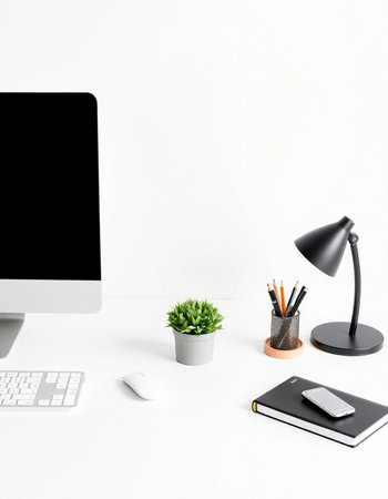 Minimalistic workspace with computer, stationery and coffee cup. Mock up