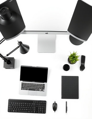 Top view of modern workplace with laptop, tablet, smartphone and other office supplies.