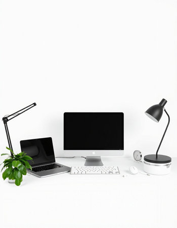 Modern workspace with computer, keyboard, mouse, lamp and plant on white background
