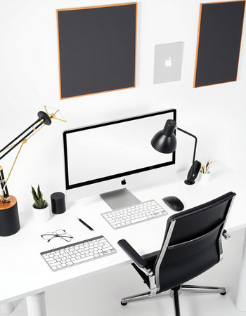 Workplace with computer, lamp, coffee cup and decorations on white table. Workplace concept