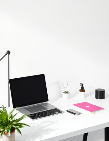 Modern workspace with laptop, smartphone, stationery and plants. Mock up