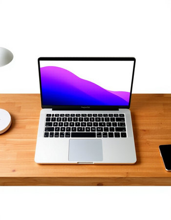 Laptop computer on wooden desk isolated on white background with clipping path