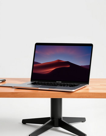 Laptop on table isolated on white background. 3d rendering.