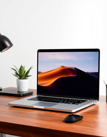 Laptop with blank screen on wooden table in office, clipping path