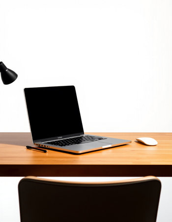 Laptop with blank screen on wooden table and black chair on white background
