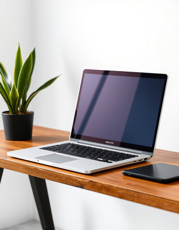 Laptop on wooden table at home. Workplace concept. Mock up