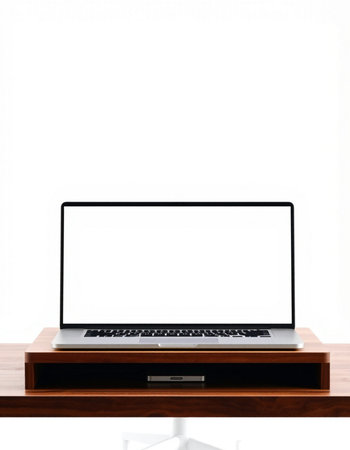 Laptop computer with blank screen on wooden table isolated on white background