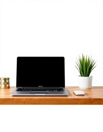 Laptop with blank screen on wooden desk isolated on white background.