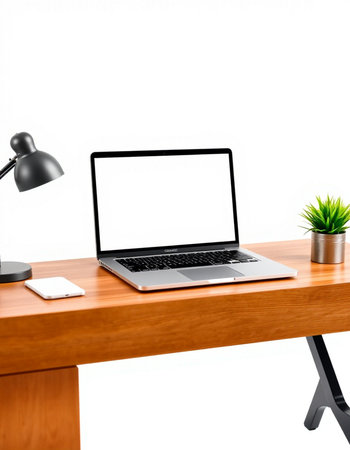 Modern workplace with blank screen laptop on wooden table isolated on white background