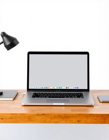 Laptop computer with blank screen on wooden desk isolated on white background