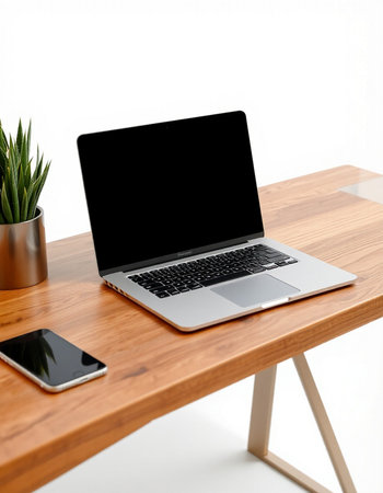 Laptop with blank screen on wooden table, isolated on white background