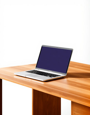 Laptop on wood table isolated on white background with clipping path.
