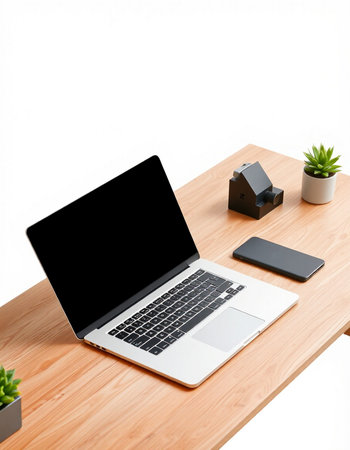Laptop computer with blank screen on wooden table isolated on white background