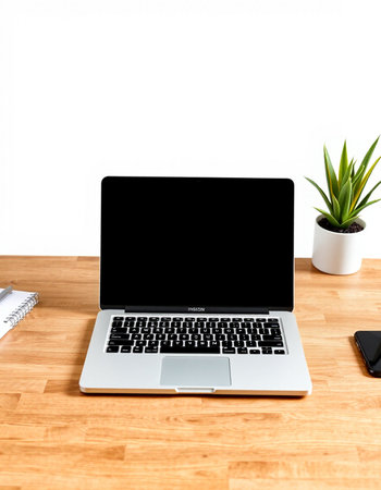 Laptop with blank screen on wooden desk, isolated on white background