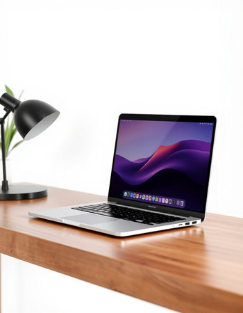 laptop on wooden table in modern room with lamp 3d render