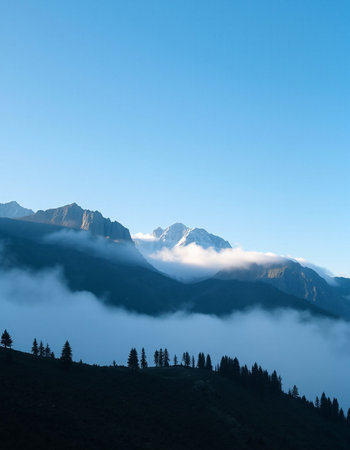 Mountains in the clouds at dawn