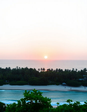 Beautiful tropical beach and sea with coconut palm tree at sunset time - Holiday Vacation conceptの写真素材