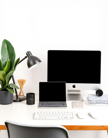 Modern workspace with computer, tablet, laptop and coffee cup on white background