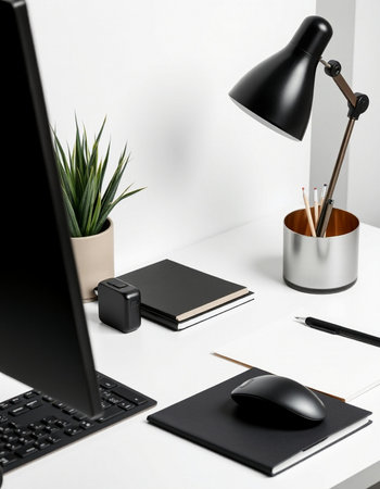 Close up of modern workplace with laptop, stationery and coffee cup on white table