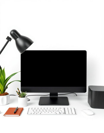 Modern workplace with computer, keyboard, mouse, lamp and plant on white background