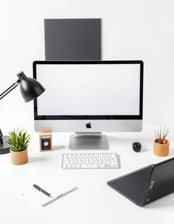 Modern workspace with blank computer screen, keyboard, mouse, stationery and other items. Mock up,...