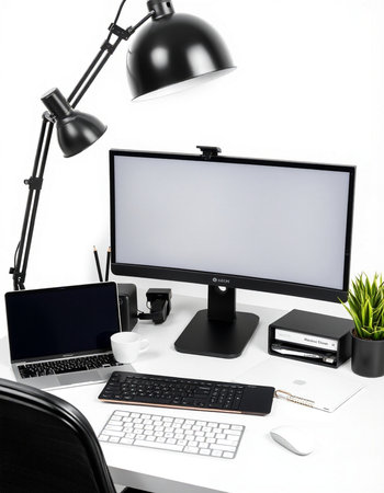 workplace with computer, laptop, coffee cup and stationery on white background