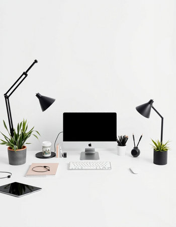 modern workplace with computer, tablet, lamp and office supplies isolated on white