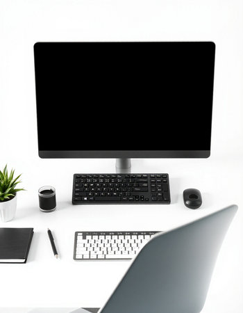 Modern workspace with computer, keyboard, mouse and notebook on white background