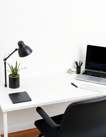 Office desk with laptop and coffee cup. Workplace concept. Mock up