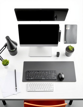 Modern workspace with computer, keyboard, mouse, notebook and graphic tablet