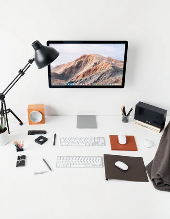 Top view of modern workplace with blank computer screen, stationery and other items. Mock up