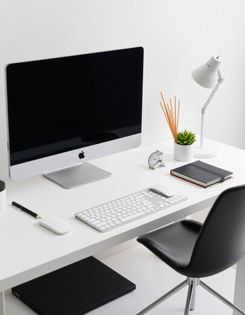 workplace with computer, keyboard and mouse on white table in office