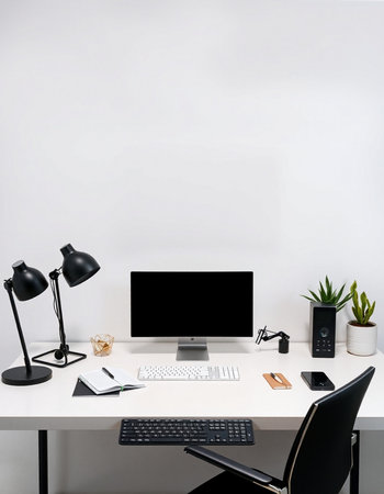 Modern workspace with computer, stationery and coffee cup on white background