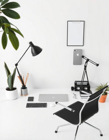 Modern workplace with computer, mobile phone and other items on white backgroundの写真素材