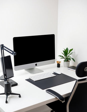Modern workspace with computer, keyboard and mouse on white table in office