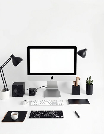 Modern workplace with blank computer screen, coffee cup, camera, stationery and supplies on white...