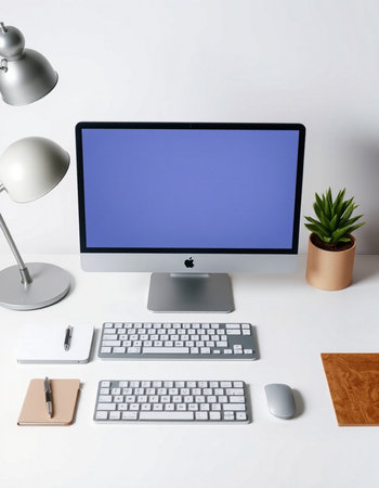 Modern workplace with computer and stationery on white background. 3d rendering.