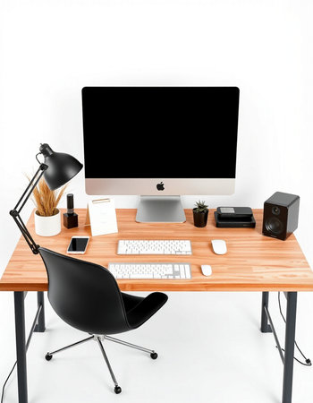 Modern workspace with computer, keyboard and mouse.