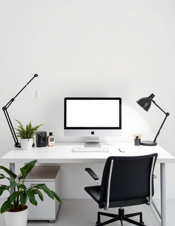 workplace with computer, lamp, lamp, plant and coffee cup