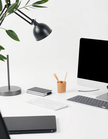 workplace with computer, lamp and stationery isolated on white background