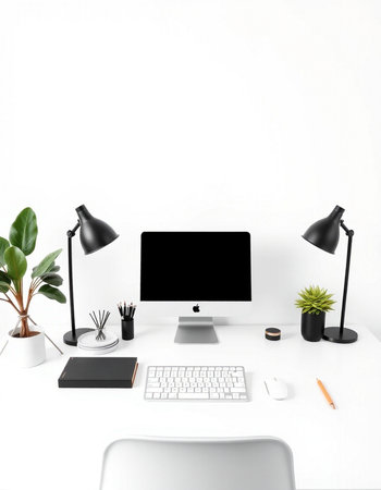 Modern workplace with computer, keyboard, mouse, coffee cup and other items on white table