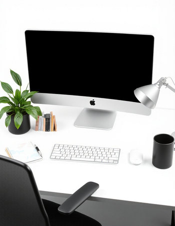 Modern workspace with computer, keyboard, mouse, coffee cup and plant on white background