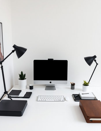 workplace with computer, stationery and lamp, interior design conceptの写真素材