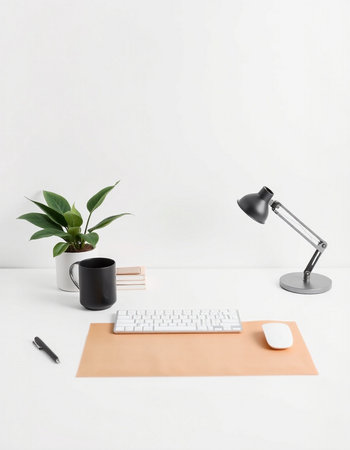 Minimalistic workspace with keyboard, mouse, coffee cup and stationery on white background.の写真素材