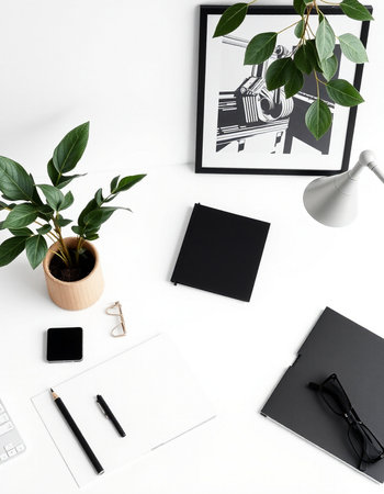 Flat lay, top view office desk table with blank notepad, smartphone, coffee cup, stationery and...
