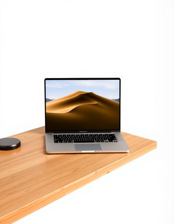 laptop with desert and sand on the table isolated on white background