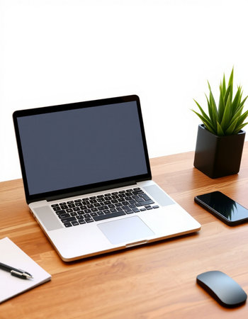 Laptop computer with blank screen on wooden desk isolated on white background