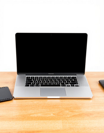 Laptop with black screen on wooden desk isolated on white background.